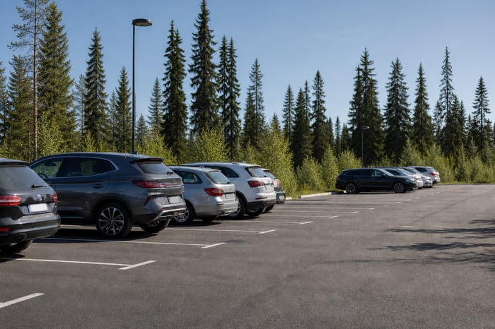 Aurora Village Parking Lot with Fir Trees Summer-1